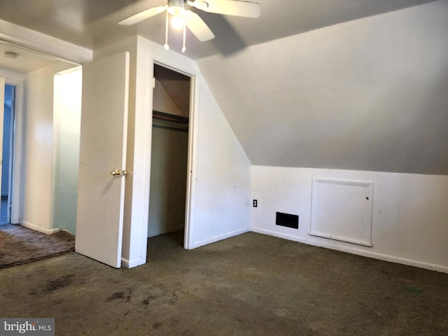 bonus room with ceiling fan and lofted ceiling