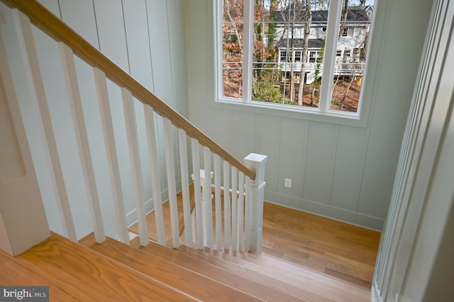 staircase featuring hardwood / wood-style floors