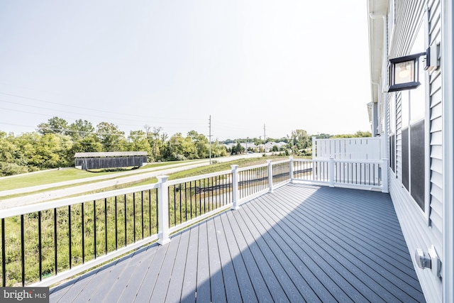 deck featuring a lawn