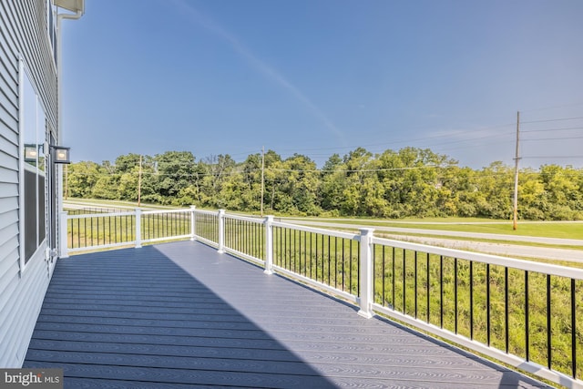 deck featuring a yard