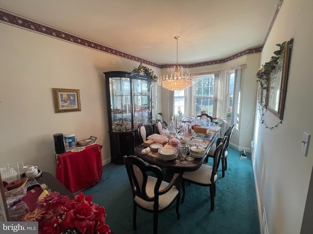 dining area with dark colored carpet and an inviting chandelier