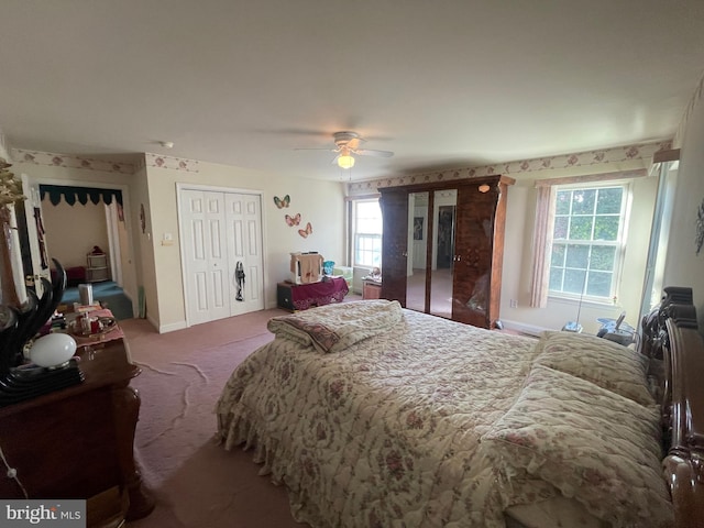 bedroom with ceiling fan and carpet