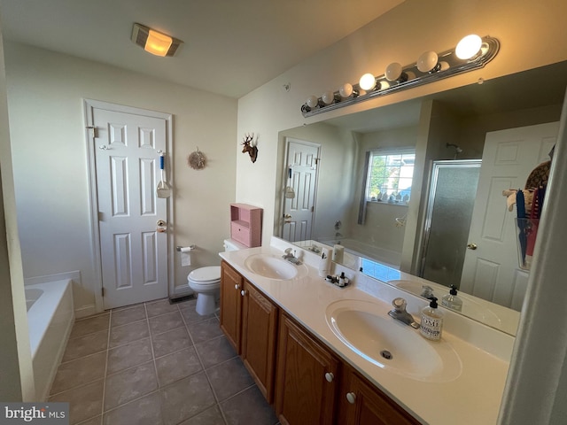 full bathroom with toilet, vanity, separate shower and tub, and tile patterned floors