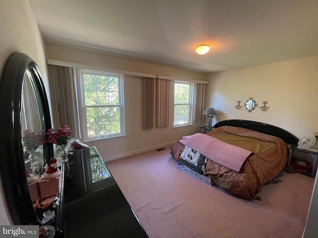 bedroom featuring carpet