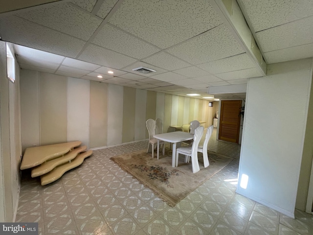 dining room featuring a paneled ceiling