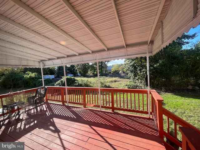 deck featuring a yard