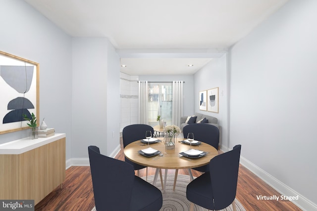 dining room featuring dark hardwood / wood-style floors