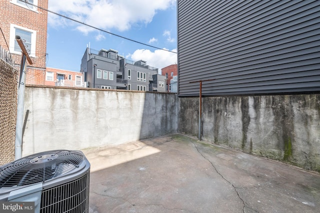 view of patio with central AC