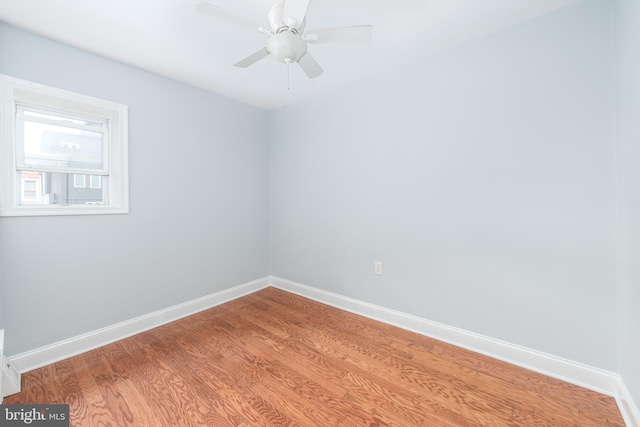 unfurnished room featuring ceiling fan and light hardwood / wood-style floors