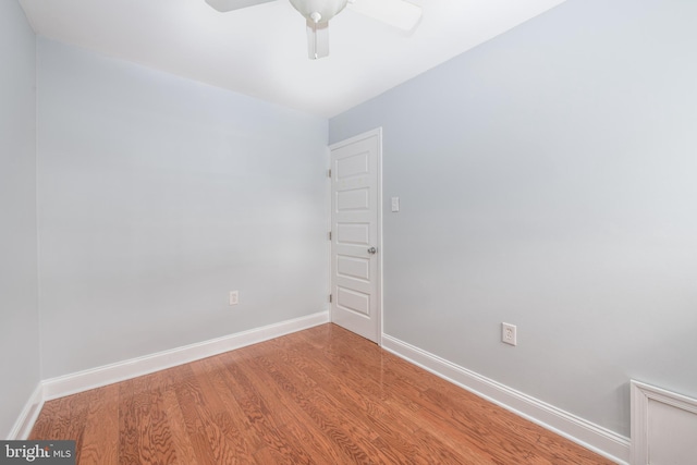 unfurnished room with wood-type flooring and ceiling fan