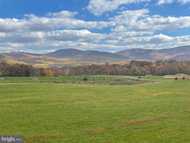 mountain view featuring a rural view