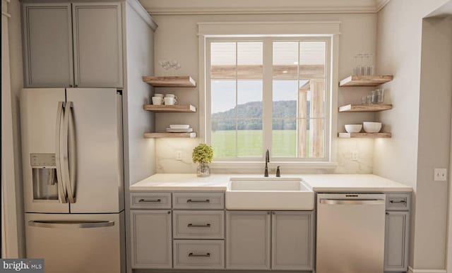 kitchen featuring a mountain view, sink, dishwasher, gray cabinets, and white refrigerator with ice dispenser