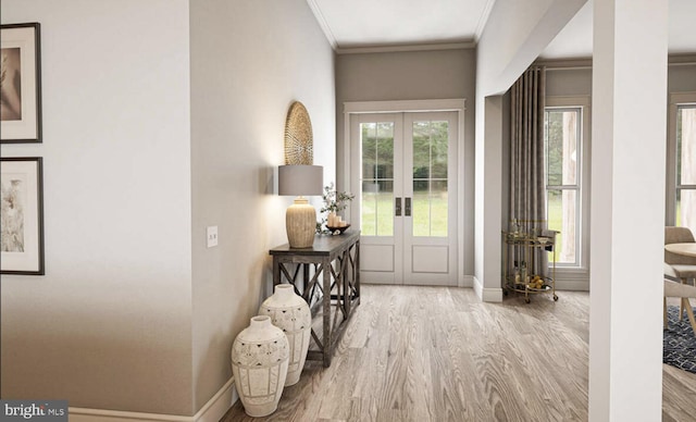 doorway to outside with crown molding, french doors, and light hardwood / wood-style flooring