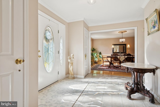 entryway featuring ornamental molding