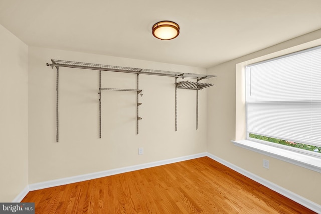 unfurnished room featuring light wood-type flooring