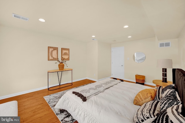 bedroom featuring wood-type flooring