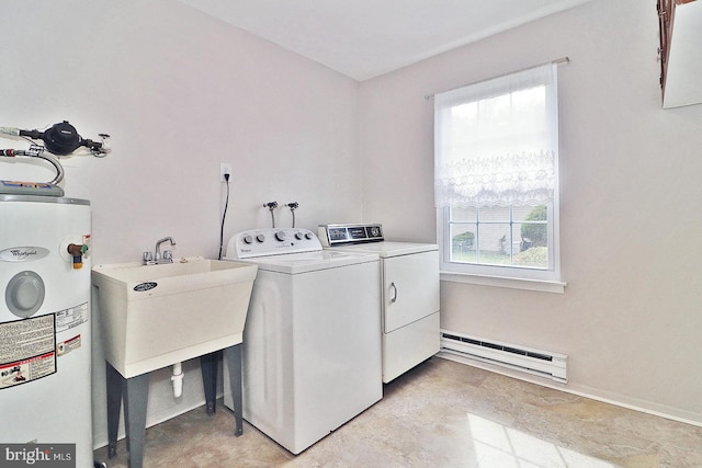 laundry area with washer and dryer, water heater, a baseboard heating unit, and sink