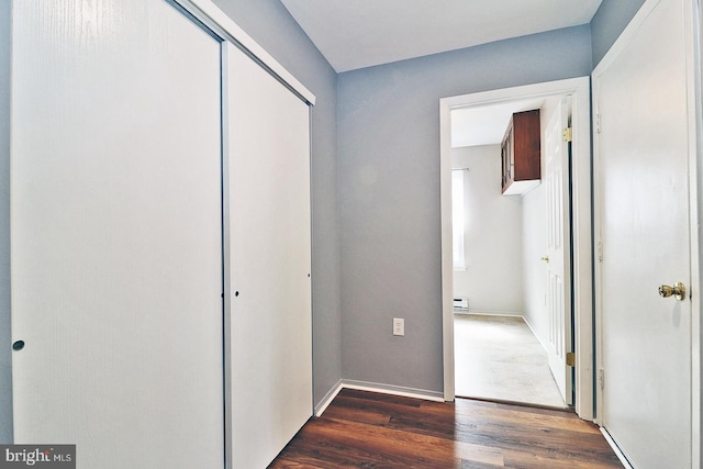 hallway featuring dark hardwood / wood-style floors