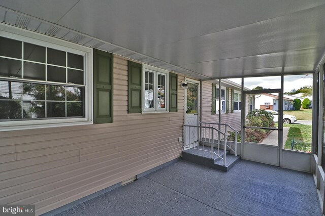 view of unfurnished sunroom