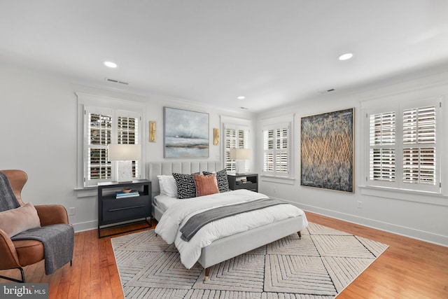 bedroom featuring wood-type flooring