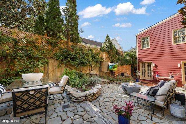 view of patio featuring french doors