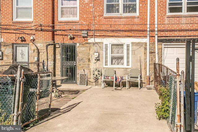 rear view of property with a patio area