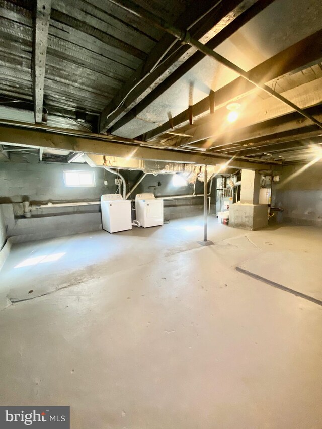 basement featuring washer and clothes dryer