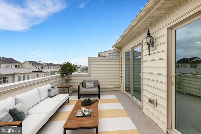 balcony with an outdoor hangout area