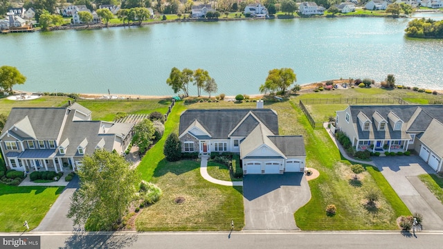 drone / aerial view with a water view