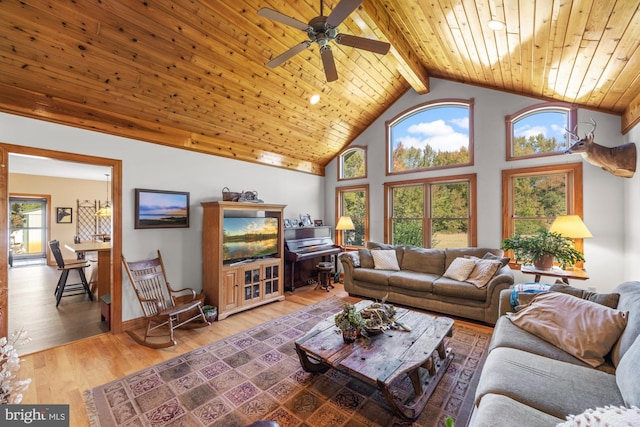 7000 Sockwell Rd, Port Norris, NJ 08349 - living room featuring light wood-type flooring, wood ceiling, beam ceiling, and ceiling fan