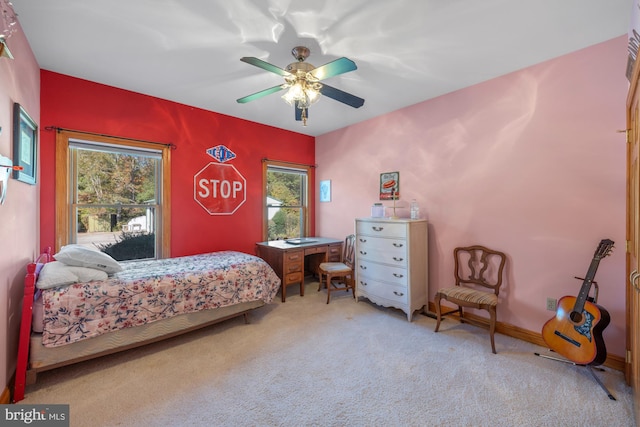 bedroom with multiple windows, carpet floors, and ceiling fan