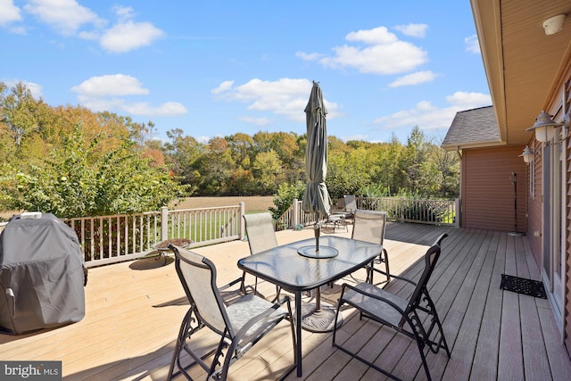 wooden terrace with grilling area