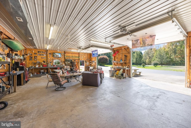 7000 Sockwell Rd, Port Norris, NJ 08349 - garage with a fireplace and a workshop area