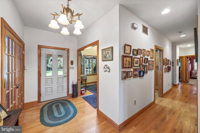 7000 Sockwell Rd, Port Norris, NJ 08349 - foyer featuring light wood-style flooring, baseboards, visible vents, recessed lighting, and a chandelier