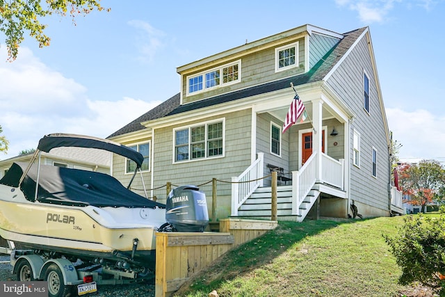 view of front of home with a front lawn