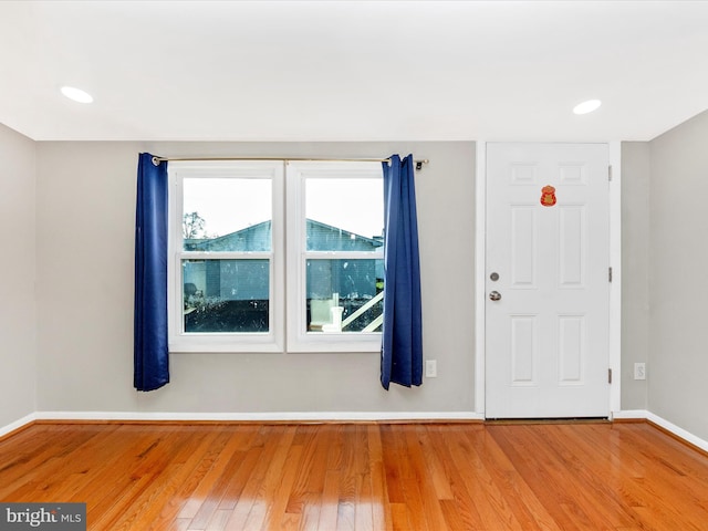 foyer with hardwood / wood-style floors