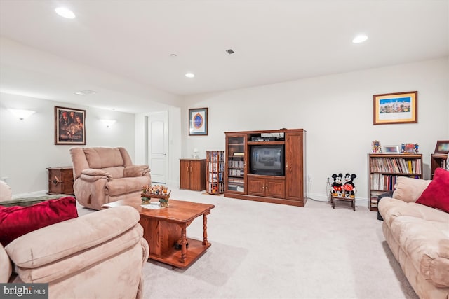 living room with light colored carpet