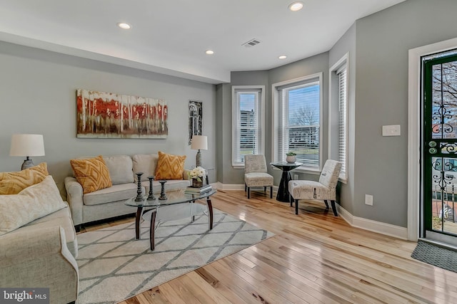 living room featuring light wood-type flooring