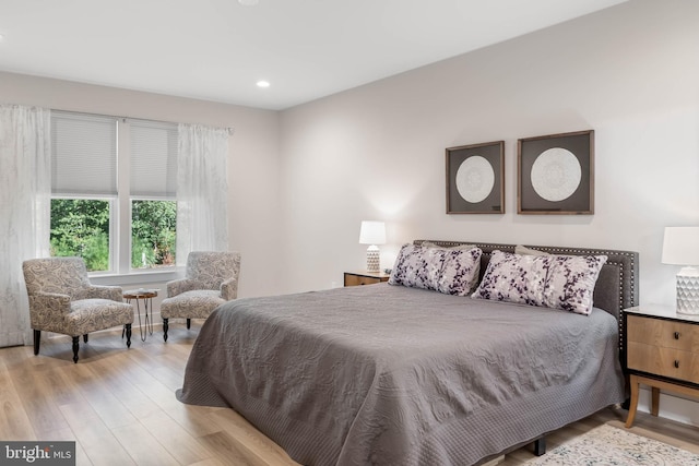 bedroom with light hardwood / wood-style flooring