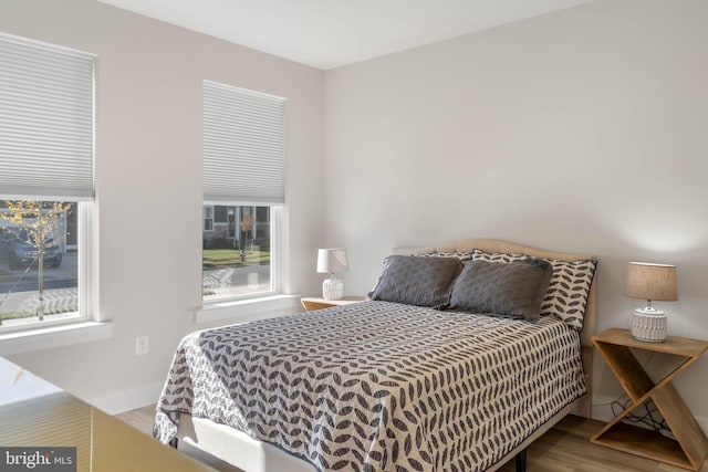 bedroom featuring hardwood / wood-style flooring