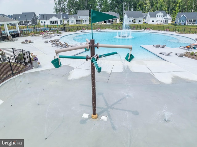 view of pool featuring pool water feature