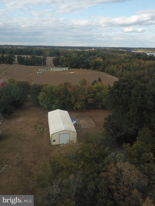 birds eye view of property featuring a rural view