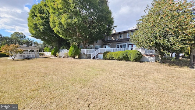 view of yard featuring a deck