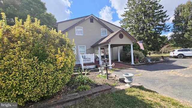 view of front of house featuring a deck