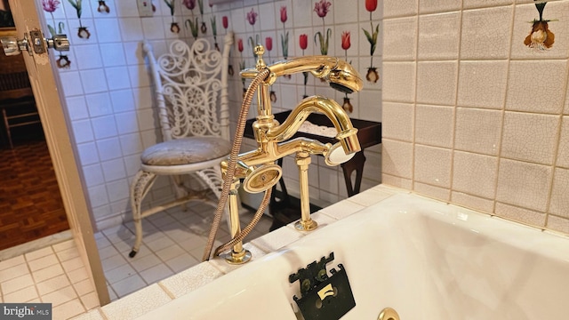 details with tile patterned floors and a bath