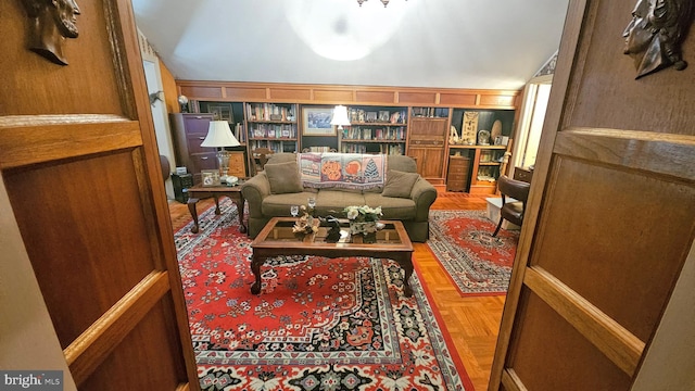 living area with parquet flooring