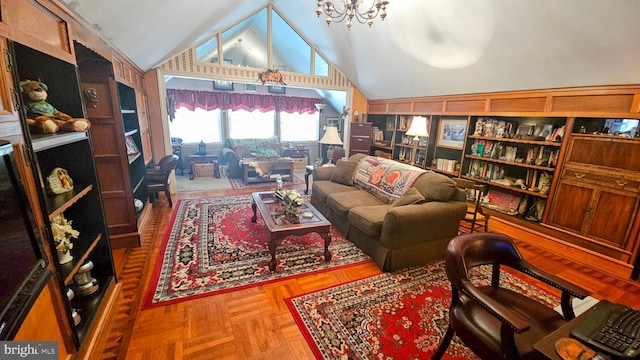 living room featuring parquet floors, lofted ceiling, and a chandelier