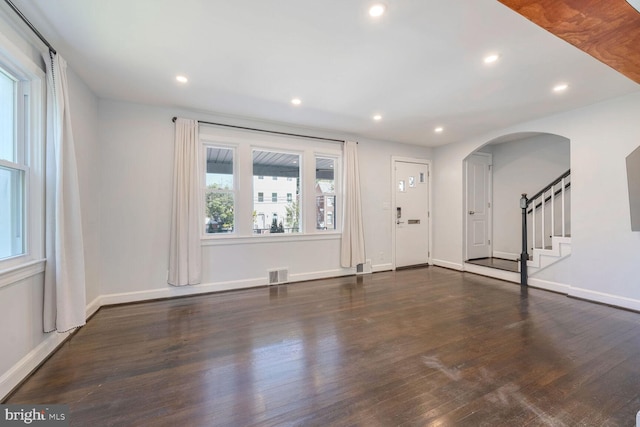 interior space featuring dark wood-type flooring