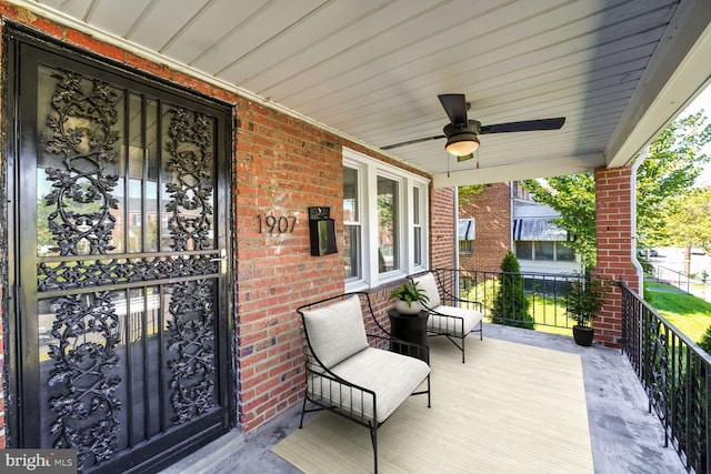 exterior space featuring covered porch and ceiling fan