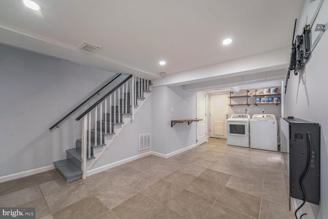 interior space with washing machine and dryer